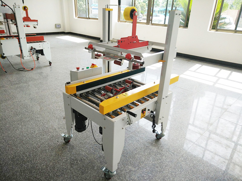 JS-FXZ500B 左(zuǒ)右驅動配聯(lian)線手動自動(dòng)折蓋膠帶封(fēng)箱機